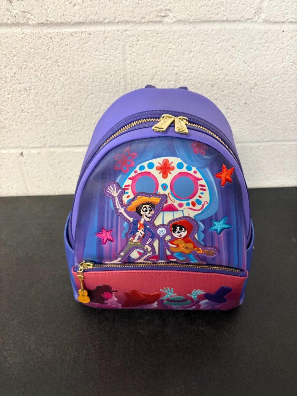 Loungefly Pixar Moments Miguel and Hector Performance Mini Backpack
